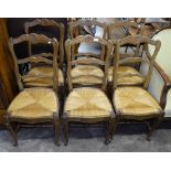 A set of 6 French oak ladder-back dining chairs with rush seats