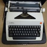 An Olympia portable typewriter, cased