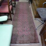 An Antique Bokora runner, 274cm x 81cm