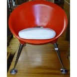 A contemporary design fibreglass chair