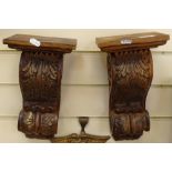 A pair of carved wood brackets, height 33cm