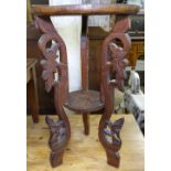 A Persian hardwood carved jardiniere stand, H65cm, w38cm