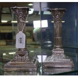 A pair of early 20th century embossed silver Corinthian column candlesticks, height 16.5cm