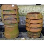 A graduated pair of terracotta chimney pots