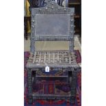 An Antique African side chair, with all over leather and brass studded upholstery and hide woven