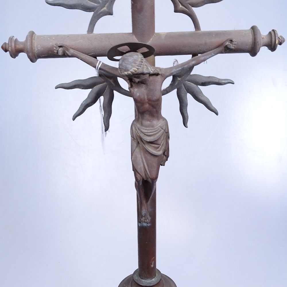 A patinated brass crucifix, 60cm