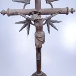 A patinated brass crucifix, 60cm