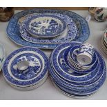 A Davenport blue and white meat plate, 52cm, another meat plate, and various willow pattern china