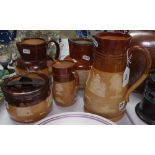 A Doulton Harvest Ware jug, 21cm, 3 smaller Doulton jugs, and a tobacco jar