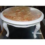 A cream painted and marble-top circular coffee table