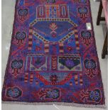 A red ground Beluchi rug, 146cm x 88cm