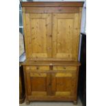 A Continental pine 2-section kitchen dresser, with fitted cupboards and drawers, W126cm, H155cm,