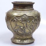 An Oriental brass vase with embossed bird and floral decoration, signed, 18cm