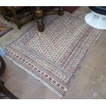 A cream ground Kilim rug, 185cm x 126cm