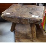 An Antique 3-legged stool, length 28cm