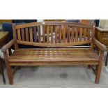 A teak slatted 3-seater garden bench, L151cm