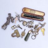 A sterling silver watch chain and compass, pocket watch keys, gold and nephrite keys