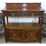 A Victorian mahogany bow-front buffet, with raised panel back, carved frieze drawers and cupboards