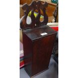 An Antique oak candle box, 49cm