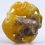 A carved Chinese hardstone pendant, 5cm