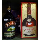 A bottle of Baileys, and a bottle of Courvoisier Cognac
