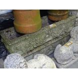 A pair of weathered rectangular concrete garden planters, with swag embossed decoration, L90cm