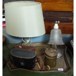 A copper tray, 2 binoculars, 2 table lamps, and a copper pot