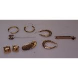 A collection of 9ct gold jewellery, to include 3 pairs of earrings, a single cufflink, a stone set