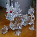 A boxed Swarovski Crystal dragon with red eyes