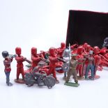 A tin of diecast and lead Vintage toy soldiers