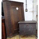 An 18th century oak hanging corner cupboard with single panel door, and an 18th century oak coffer