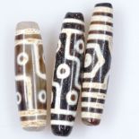 3 Oriental decorated stone beads, 5.5cm approx