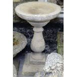 A concrete garden birdbath, H71cm