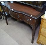 An Edwardian mahogany bow-front writing desk, with red leather skiver, 3 frieze drawers, on square