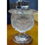 A moulded glass lion's head Vintage cigarette lighter, signed Lalique, height 11.5cm