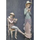A Lladro girl, L5000, and a Lladro flautist, 24cm