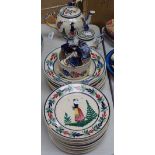 A Quimper teapot, sugar bowl, plates etc