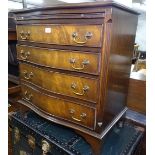 A mahogany serpentine-front bachelor's chest, with brushing slide, 4 long drawers under, on