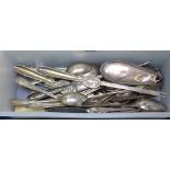 A box of plated teaspoons, lobster picks etc