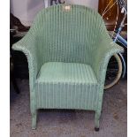 A green painted Lloyd Loom bedroom chair