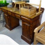 A small Regency flame veneered mahogany pedestal sideboard, with raised carved back, barrel turned