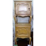 A pair of Continental oak bedside cupboards, W48cm