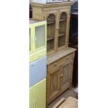 A pine 2-section kitchen dresser, with fitted drawer and cupboards, W115cm, H202cm