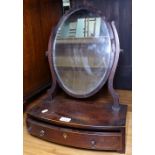 A small 19th century bow-front box swing toilet mirror