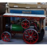 A boxed Mamod steam tractor