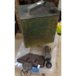 A Bakelite electric hot water bottle, an Esso petrol can with brass cap, and a garden sprayer