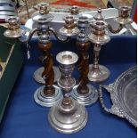 A pair of silver plated 3-branch candelabras, a pair of oak barley twist and chrome-mounted