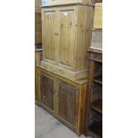 2 polished pine 2-door cabinets