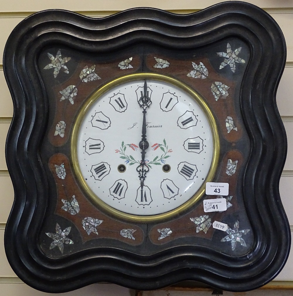 A French 2-train wall clock in ebonised frame, with inlaid mother-of-pearl decoration, by J