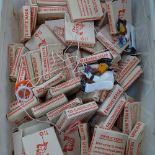 A box of miniature Empire made plastic toys